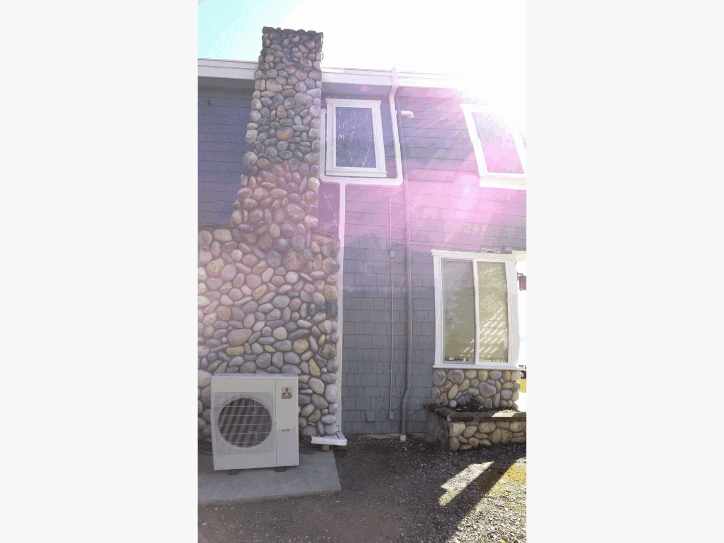 Stone chimney on house exterior