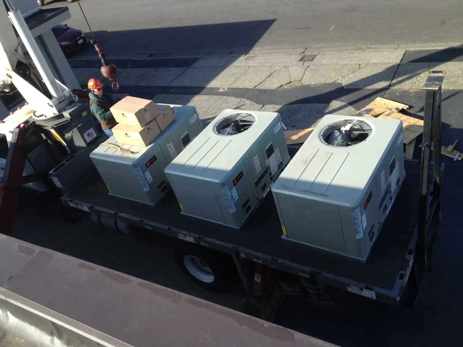 Industrial equipment loaded on flatbed truck